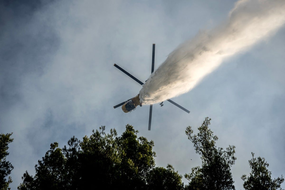 Two dead after firefighting helicopters collide west of Athens