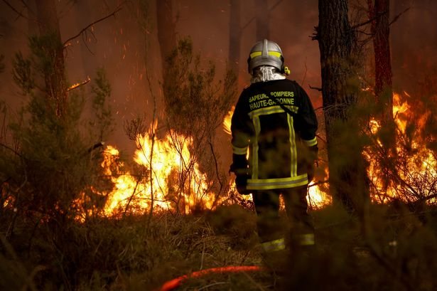 Thousands evacuated from French Atlantic coast resorts as wildfires spread near Bordeaux