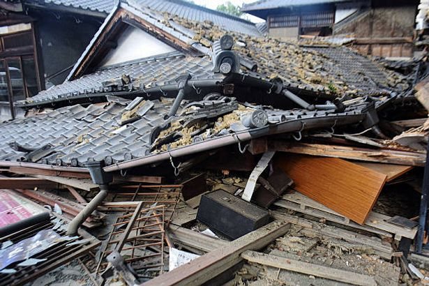 Rescue teams race to find survivors after Japan earthquake kills at least 13
